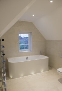  LED DOWNLIGHT WITH DUAL WATTAGE AND CCT In a bathroom